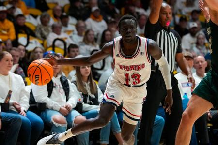 Cardiac Cowboys Make Magic Once Again Rallying Past No. 24/23 Colorado State 79-76 in Overtime