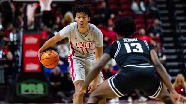 Runnin' Rebels Stun No. 22 Utah State With Thrilling 65-62 Win